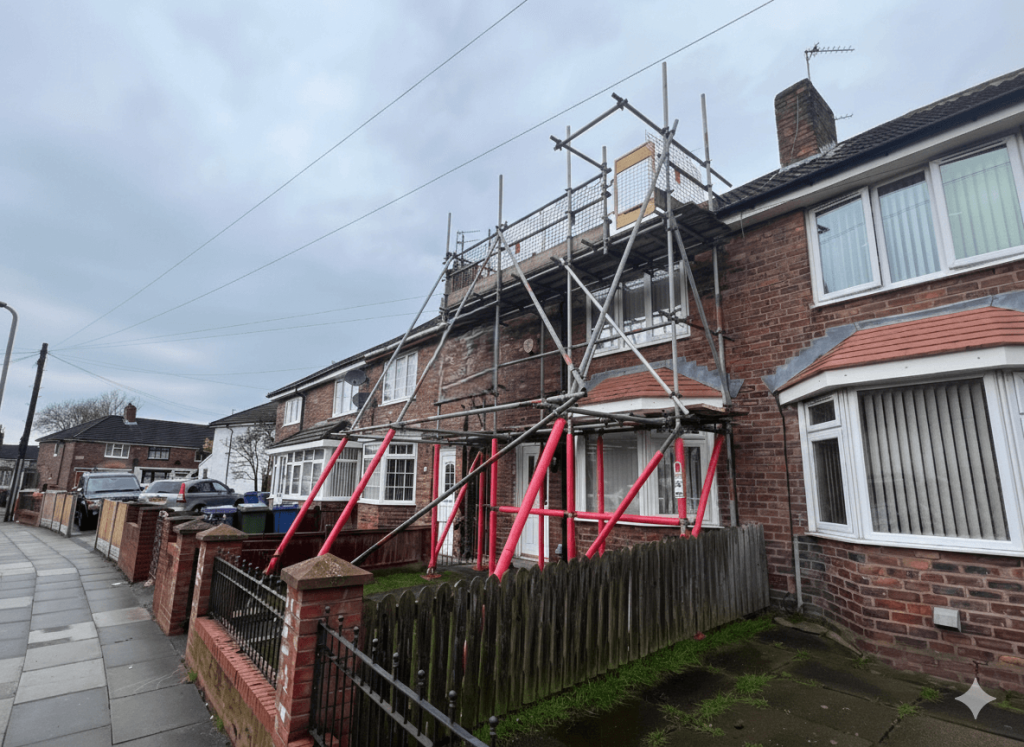 residential property with scaffolding access with guard rails